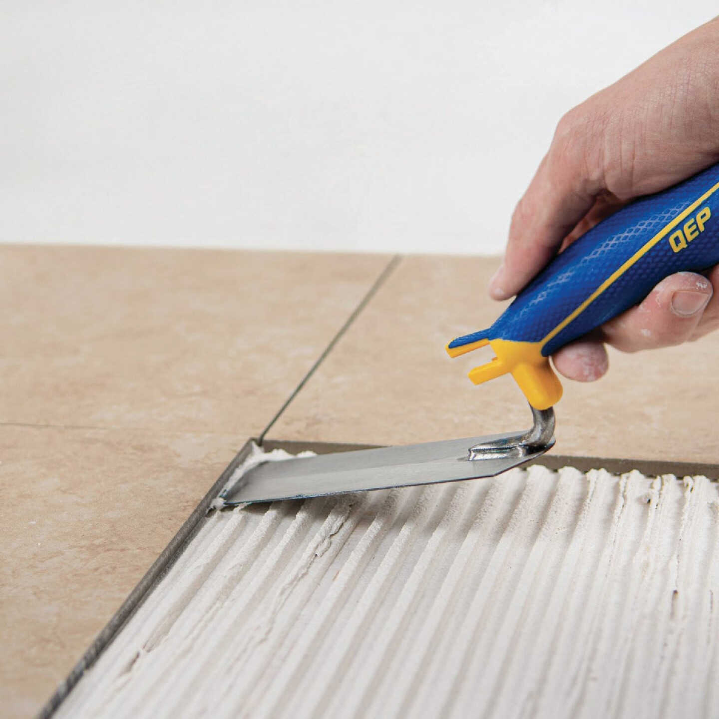 QEP 6 In. x 2 In. Flat Margin Trowel with Bucket Hook & Comfort Grip Image 3