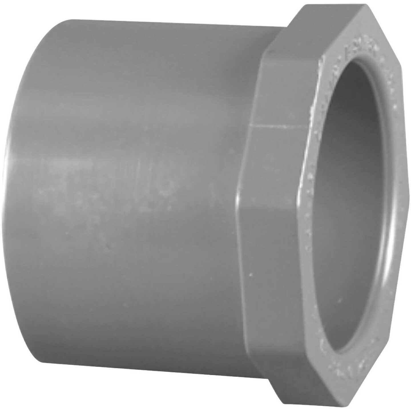Charlotte Pipe 1 In. Spigot x 3/4 In. Slip Schedule 80 PVC Bushing Image 1
